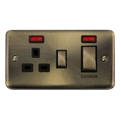 Curved Antique Brass 45A Ingot 2 Gang DP Switch With 13A DP Switched Plug Socket & Neons - Black Trim